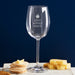 Engraved wine glass with apple icon and “After School Snack” design for teachers
