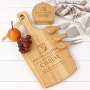 Engraved wooden paddle serving board with matching cheese knife block set