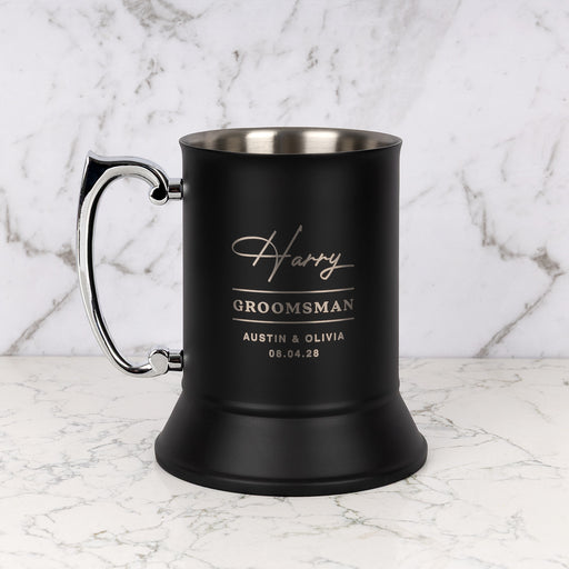 Personalised matte black beer mug engraved with name, wedding role and details.