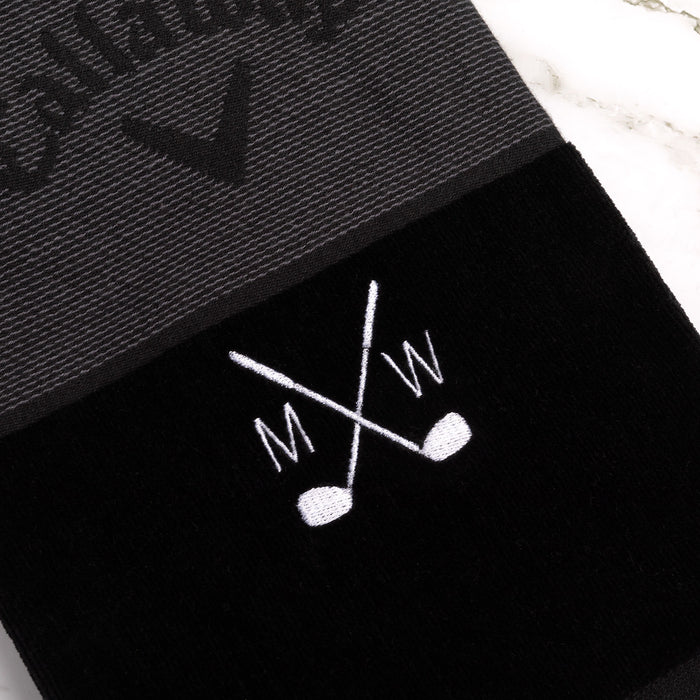 Custom black tri-fold golf towel featuring Callaway logo and carabiner clip