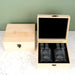 Luxury corporate whiskey gift set featuring custom logo engraving and premium bar accessories in a wooden presentation box.