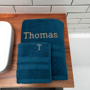 Navy cotton towel set featuring name and initial embroidery, ideal personalised gift for all occasions