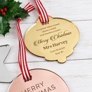 Engraved teacher Christmas ornament in mirror gold acrylic with red and white striped ribbon.