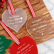 Engraved teacher Christmas ornaments with custom names, messages and candy-striped ribbons.