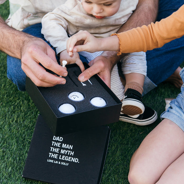 Stylish golfer gift box filled with golf essentials