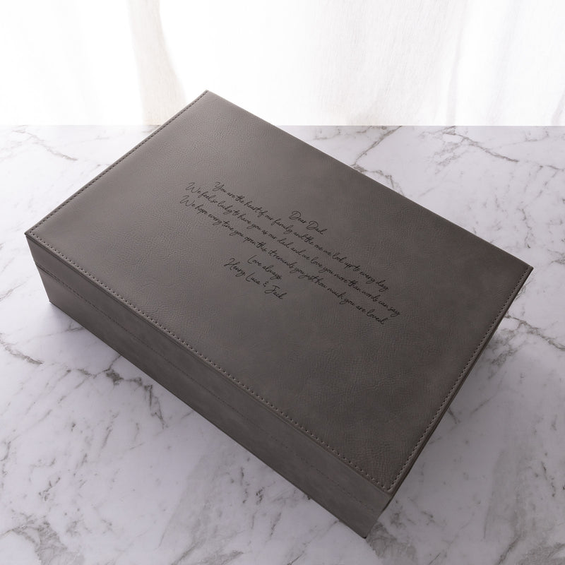 Personalised grey leatherette keepsake box with custom laser engraving and black velvet-lined interior.