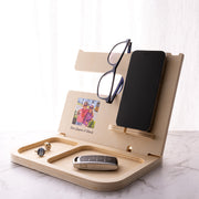Personalised wooden accessories holder with custom photo and message, designed to organise a phone, watch, wallet, keys and glasses.