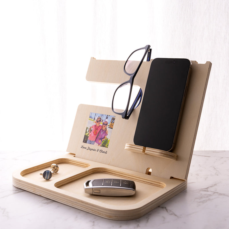 Personalised wooden accessories holder with custom photo and message, designed to organise a phone, watch, wallet, keys and glasses.