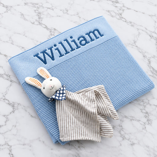 Personalised baby blue knitted blanket embroidered with name