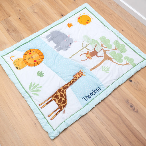 Personalised safari baby blanket with embroidered name featuring lion, giraffe, hippo, and monkey design.