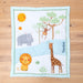 Safari-themed cot blanket laid flat, showcasing vibrant jungle animals and personalised detail.