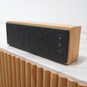 Engraved bamboo Bluetooth speaker for music lovers, featuring wireless connectivity and premium sound.