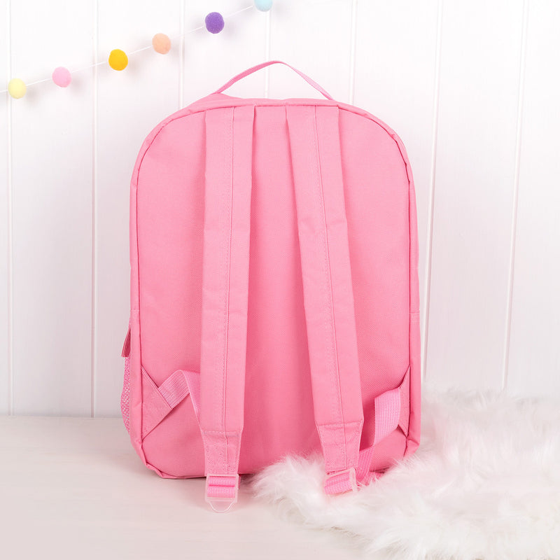 Back view of pink children’s backpack showing padded adjustable shoulder straps.