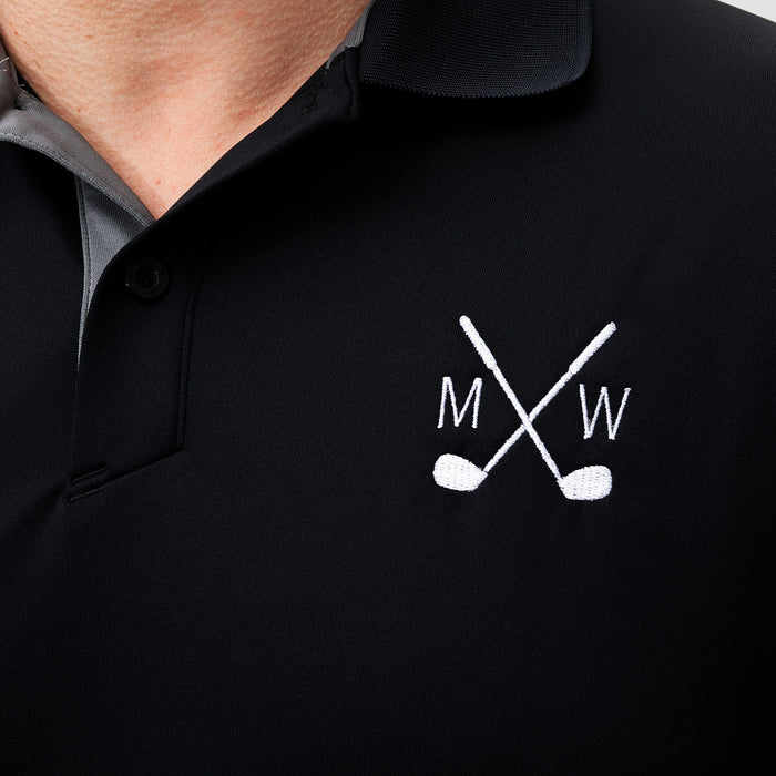 Black Under Armour golf polo featuring custom monogram and moisture-wicking fabric
