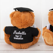 Chocolate brown teddy bear holding certificate, wearing embroidered graduation gown, perfect keepsake gift