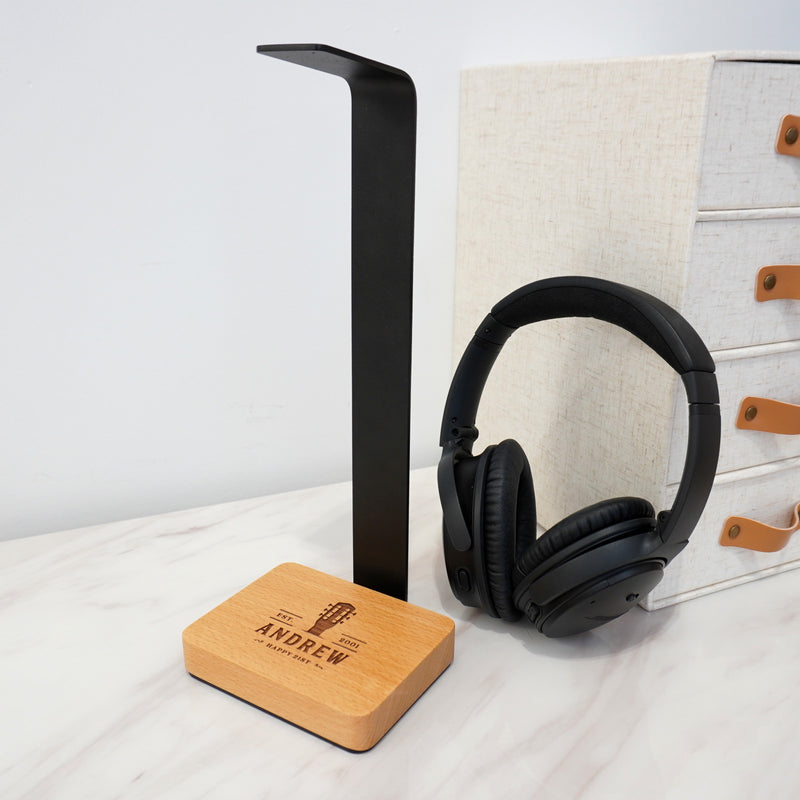 Engraved headphone holder with personalised beech wood base for music lovers, gamers and home offices.