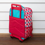 Back view of mermaid-themed kids trolley case showing handle, wheels, and patterned sides.