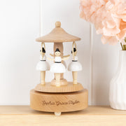 Personalised wooden musical ballerina carousel made from beech wood with spinning ballerinas and engraved name detail