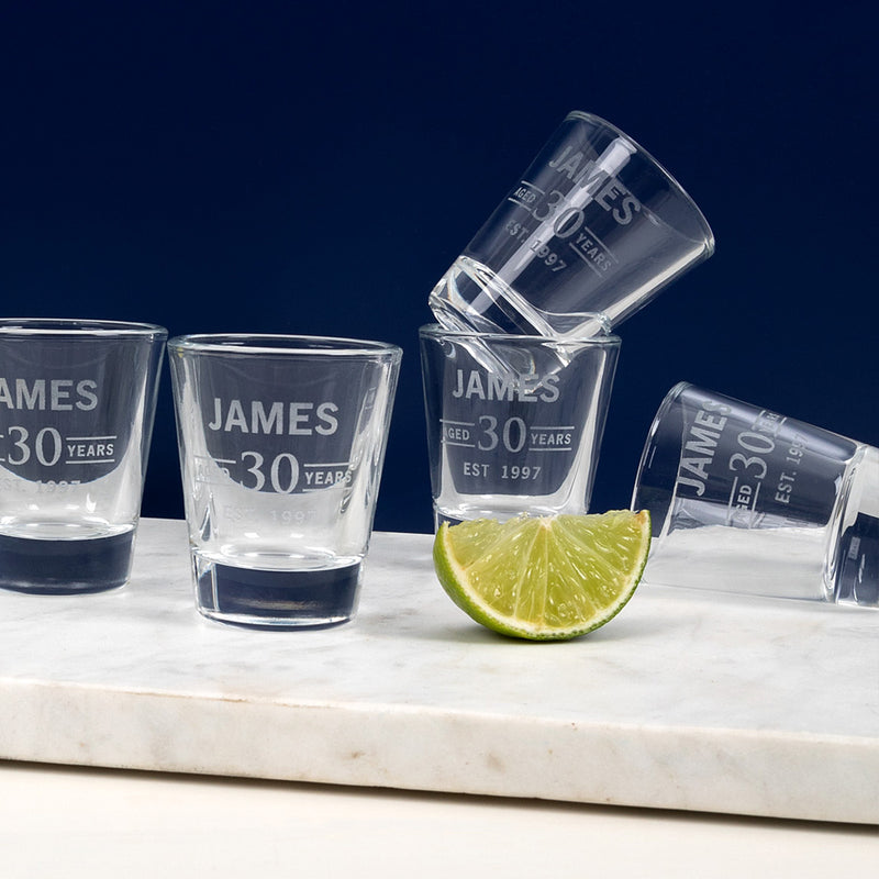 Custom 30th birthday shot glass in classic shape, perfect for milestone celebrations.