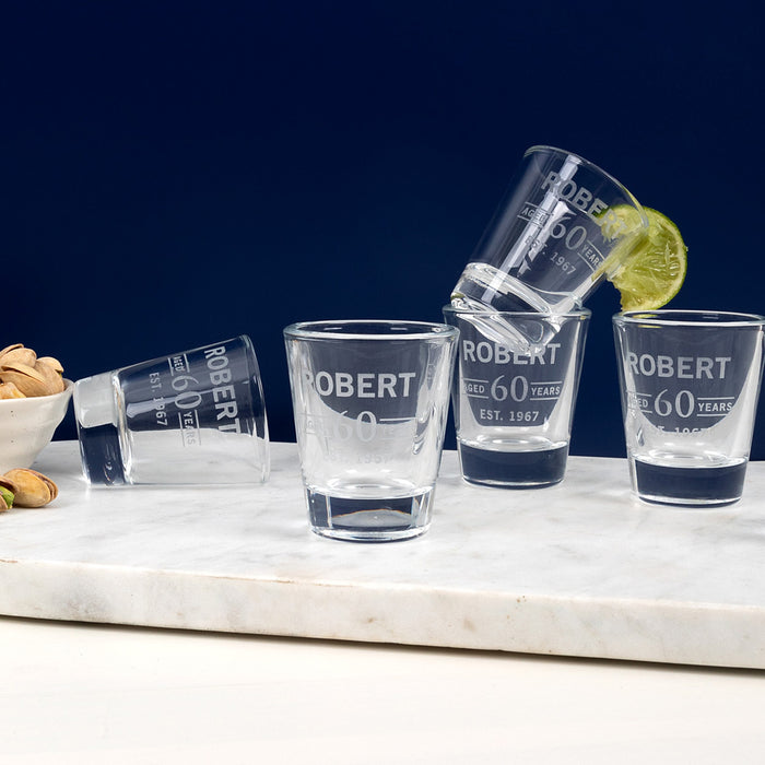 Personalised 50ml shot glass engraved with 60th birthday design, name, and celebration date.