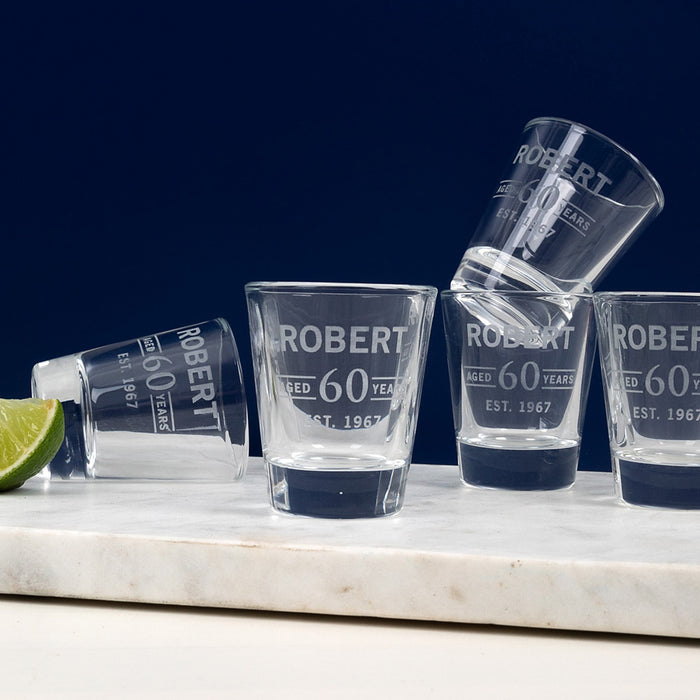 Custom 60th birthday shot glass with classic shape, ideal for gifts or party favours.