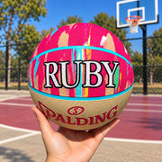 Personalised Spalding Pink Multi Marble Basketball with custom engraved name, a unique basketball gift for kids.