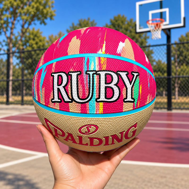 Personalised Spalding Pink Multi Marble Basketball with custom engraved name, a unique basketball gift for kids.