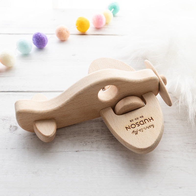 Personalised wooden aeroplane toy engraved with child’s name in premium beech wood