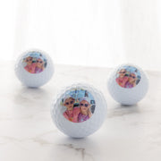 Close-up of custom golf balls printed with a photo, perfect gift for Father’s Day or birthdays.