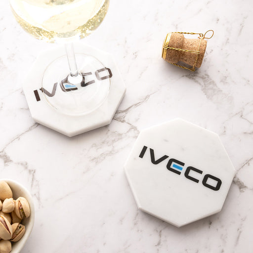 Personalised white marble coaster printed in full colour with a corporate logo, featuring a premium octagonal design for client and employee gifts.