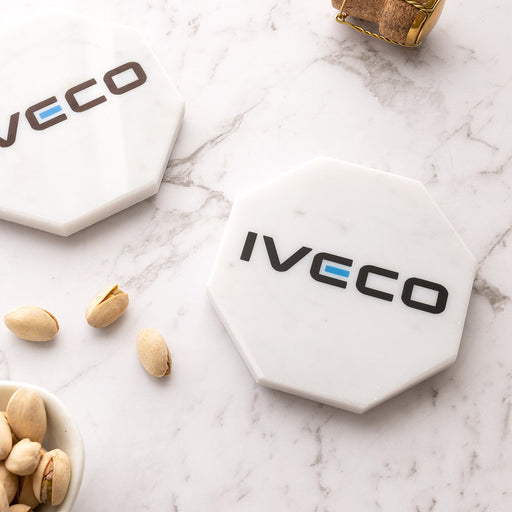 White marble octagonal coaster customised with a full colour business logo, ideal for corporate events, EOFY gifts and office branding.