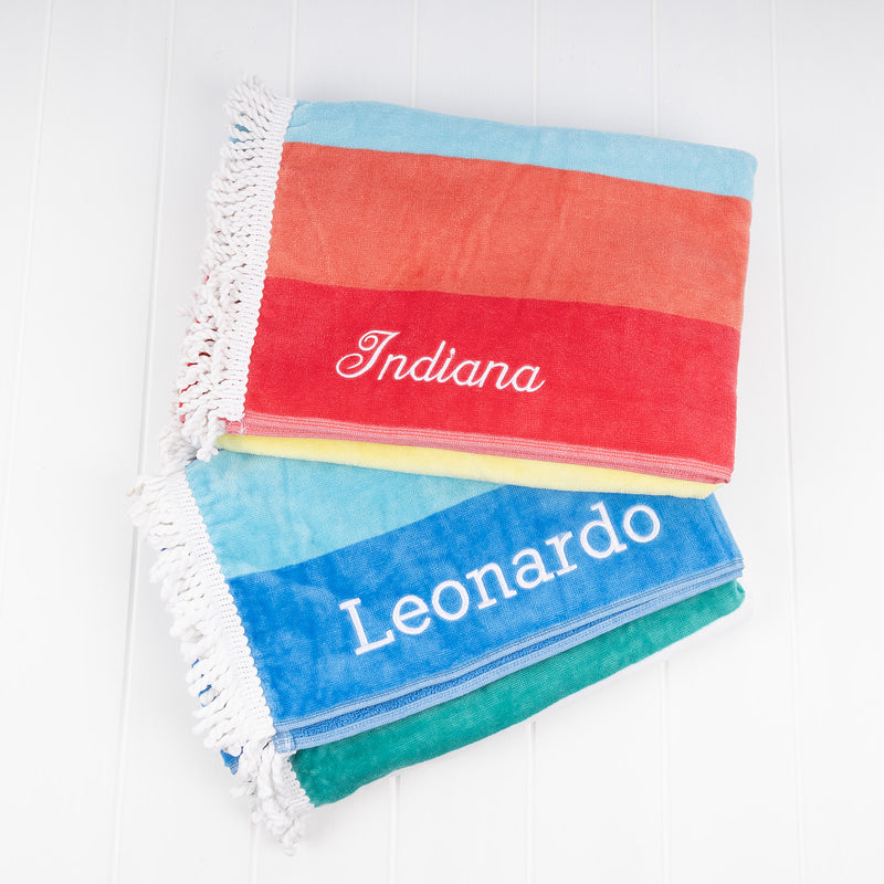 Personalised striped beach towel embroidered with first name