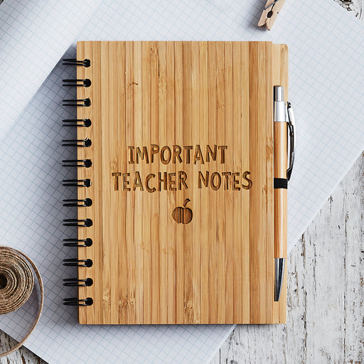 Bamboo notebook engraved with “Important Teacher Notes” and apple icon