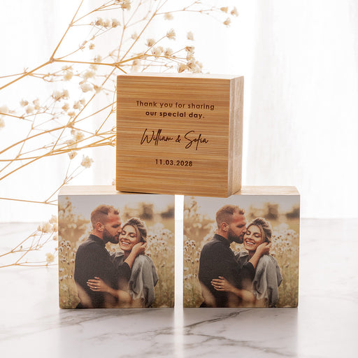 Personalised bamboo photo block wedding favour featuring a full colour engagement photo and engraved thank you message, presented in a premium gift box.