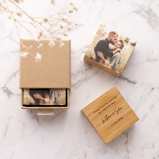 Wedding guest favour with a printed bride and groom photo on the front and a personalised engraved message on the back in a bamboo keepsake block.