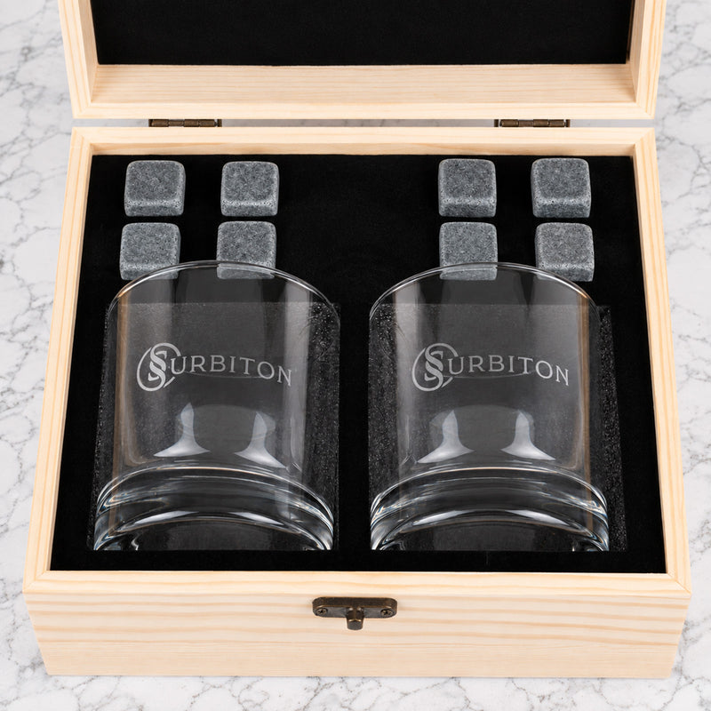 Premium corporate whiskey set with personalised glasses and company logo engraved on a wooden gift box, perfect for clients and colleagues.