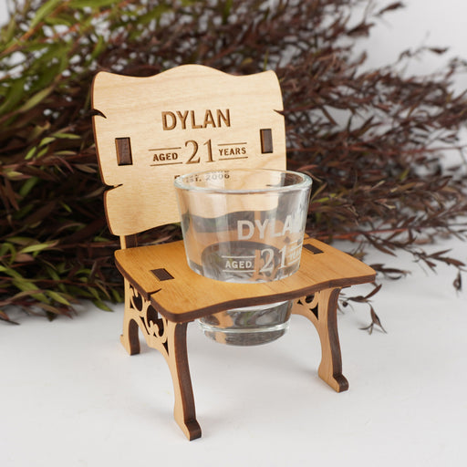 Unique personalised wooden shot glass chair with engraved name and birthday date, a fun birthday gift.