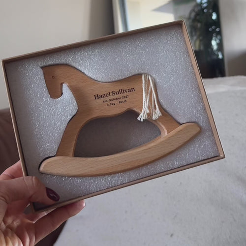 Personalised wooden rocking horse toy engraved with child’s name and birth date, made from natural beech wood
