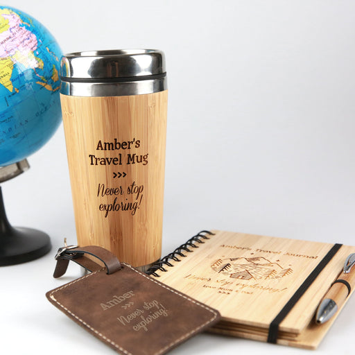 Personalised Travel Hamper include engraved travel mug, travel journal and leather luggage tag.