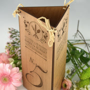 Customised engraved wedding reception wooden menu and table number centrepiece
