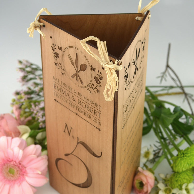 Customised engraved wedding reception wooden menu and table number centrepiece