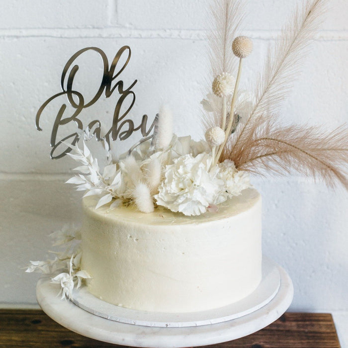 https://personalizedfavors.com/cdn/shop/products/oh-baby-acrylic-cake-topper-1_1_700x700.jpg?v=1692677630